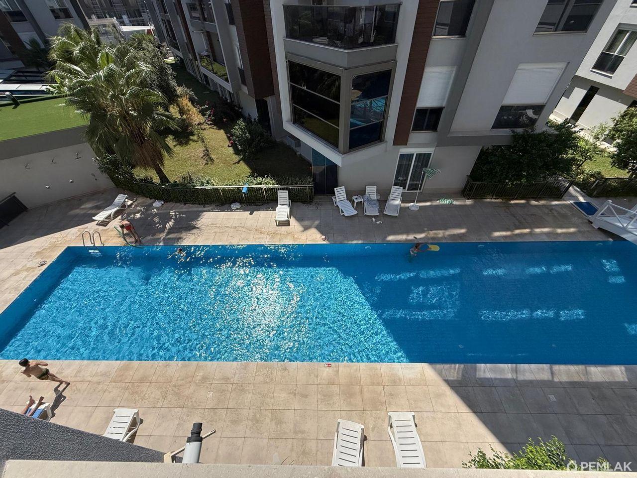 Türkiye'de Satılık Emlak: Hurma'da yüzme havuzlu ve SPA'lı modern bir sitede geniş 2+1 daire - image 1