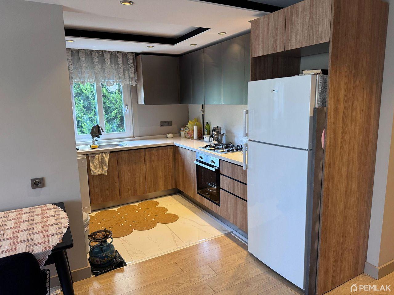 Apartment 2+1 with swimming pool and security in the area Liman - image 1